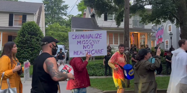 Protestors and drummers marched outside of Kavanaugh's house after an alleged assassination attempt. Major U.S. newspapers downplayed the attempted murder. 