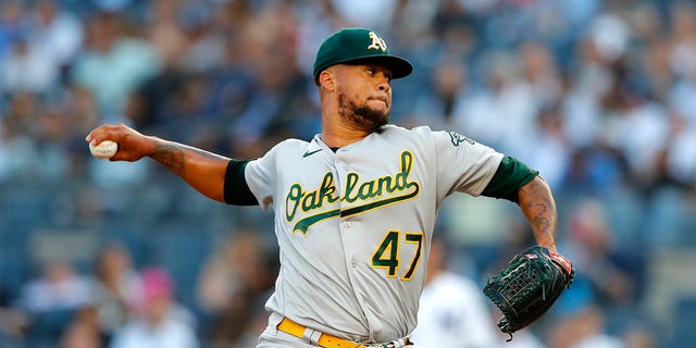 Oakland Athletics starting pitcher Frankie Montas throws to a New York Yankees batter during the first inning of a baseball game Tuesday, June 28, 2022, in New York.