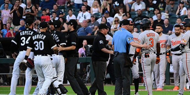 The Chicago White Sox and Baltimore Orioles cleared their benches in the second inning after Jorge Mateo (3) of the Orioles was hit by a pitch from Michael Kopech (34) of the White Sox at Guaranteed Rate Field June 24, 2022, in Chicago. 