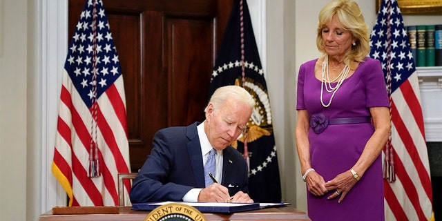 President Biden signs into law the Bipartisan Safer Communities Act gun safety bill. (AP Photo/Pablo Martinez Monsivais)