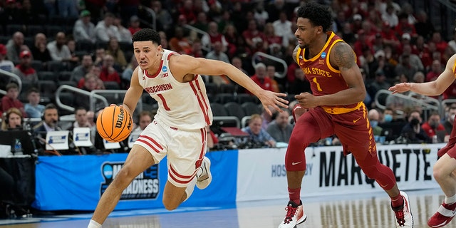 Johnny Davis of the Badgers drives against the Iowa State Cyclones during the NCAA Men's Basketball Tournament at Fiserv Forum on March 20, 2022, in Milwaukee, Wisconsin.