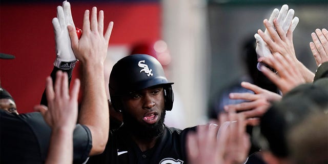 Chicago White Sox's Luis Robert is congratulated for his two-run home run during the fifth inning of a baseball game against the Los Angeles Angels on Tuesday, June 28, 2022, in Anaheim, Calif. 