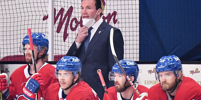 Assistant coach Luke Richardson of the Montreal Canadiens assumes head coaching responsibilities against the Vegas Golden Knights during the first period in Game Three of the Stanley Cup Semifinals of the 2021 Stanley Cup Playoffs at Bell Centre on June 18, 2021 in Montreal, Quebec. Head coach Dominique Ducharme , tested positive for COVID-19 earlier in the day.