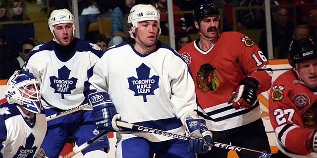 Peter Ing #1, Al Iafrate #33 and Luke Richardson #2 of the Toronto Maple Leafs skate agains Michel Goulet #16 and Jeremy Roenick #27 of the Chicago Blackhawks during NHL game action on December 8, 1990 at Maple Leaf Gardens in Toronto, Ontario Canada.
