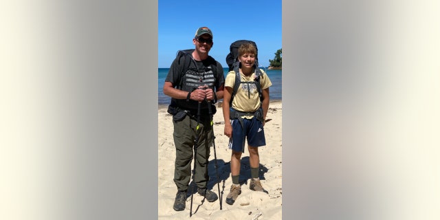 Father and son with their gear during a hike. Dad Dan Skrypczak told Fox News Digital he's immensely proud of his son, Eli, for how he helped the victims of Monday's train derailment. 