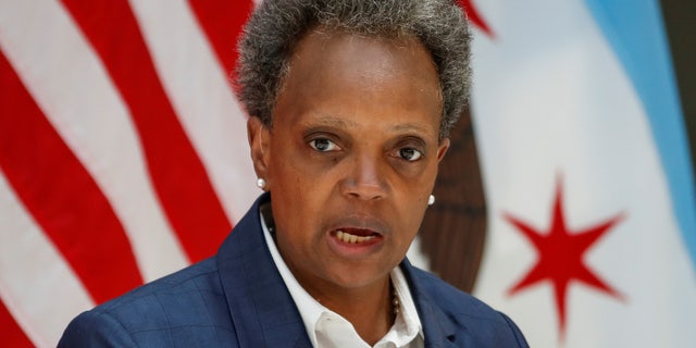 FILE PHOTO: Chicago's Mayor Lori Lightfoot speaks during a science initiative event at the University of Chicago in Chicago, Illinois, U.S. July 23, 2020. REUTERS/Kamil Krzaczynski/File Photo