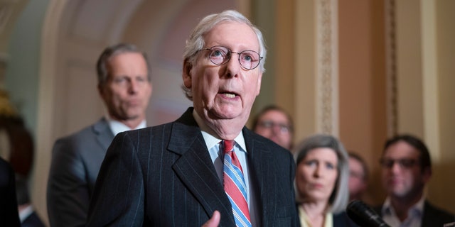 Senate Minority Leader Mitch McConnell, R-Ky., speaks to reporters after a Republican strategy meeting at the Capitol in Washington, Tuesday, March 8, 2022. 