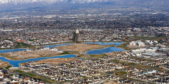 According to a new study released Monday, by the U.S. Census Bureau, by age 26 more than two-thirds of millennials lived in the same general area where they grew up, 80% had moved less than 100 miles away and 90% resided less than 500 miles away. Pictured: A suburban area in Salt Lake City.