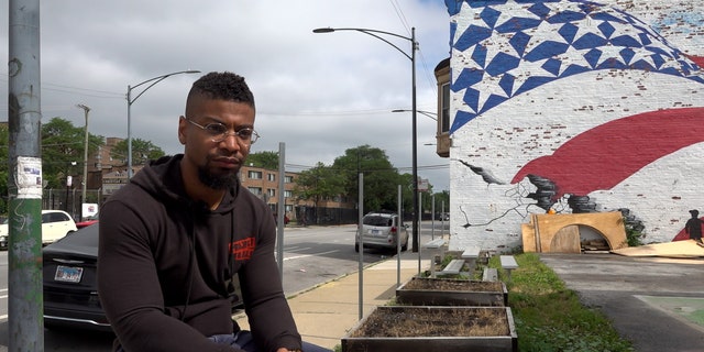 Assistant pastor TJ Grooms sits outside of New Beginnings Church in South Side Chicago. (Fox News Digital/Lisa Bennatan)
