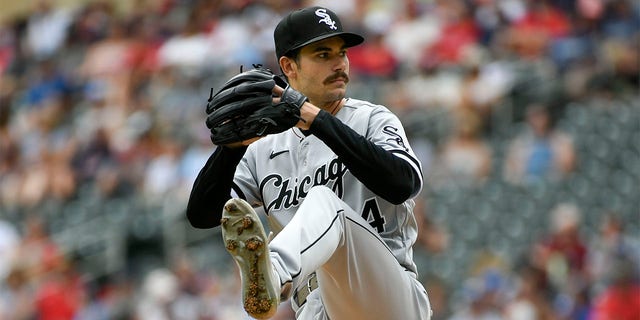 Chicago White Sox pitcher Dylan Cease throws against the Minnesota Twins during the first inning of a baseball game, Sunday, July 17, 2022, in Minneapolis. 