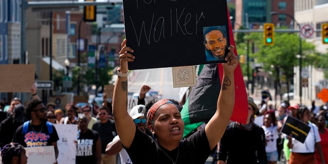 Demonstrators gather outside Akron City Hall to protest the killing of Jayland Walker, shot by police, in Akron, Ohio, July 3, 2022.
