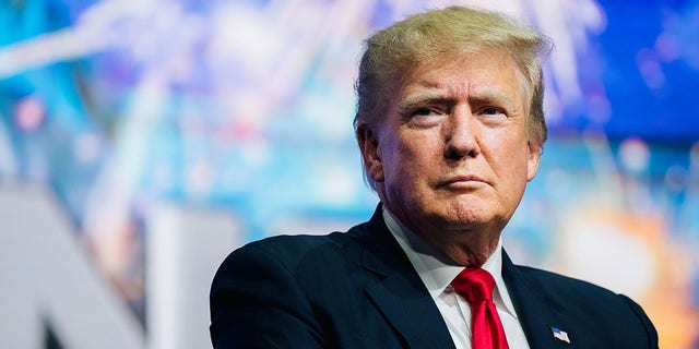 PHOENIX, ARIZONA - JULY 24: Former U.S. President Donald Trump prepares to speak at the Rally To Protect Our Elections conference on July 24, 2021 in Phoenix, Arizona. The Phoenix-based political organization Turning Point Action hosted former President Donald Trump alongside GOP Arizona candidates who have begun candidacy for government elected roles. (Photo by Brandon Bell/Getty Images)