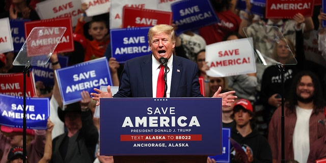 Former U.S. President Donald Trump speaks at a rally at Alaska Airlines Center on July 09, 2022 in Anchorage, where he campaigned with House candidate and former Alaska Gov. Sarah Palin and Senate candidate Kelly Tshibaka.