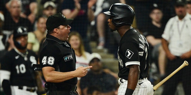Tim Anderson (7) of the Chicago White Sox is ejected from a game after making contact with umpire Nick Mahrley (48) in the seventh inning against the Oakland Athletics at Guaranteed Rate Field July 29, 2022, in Chicago.