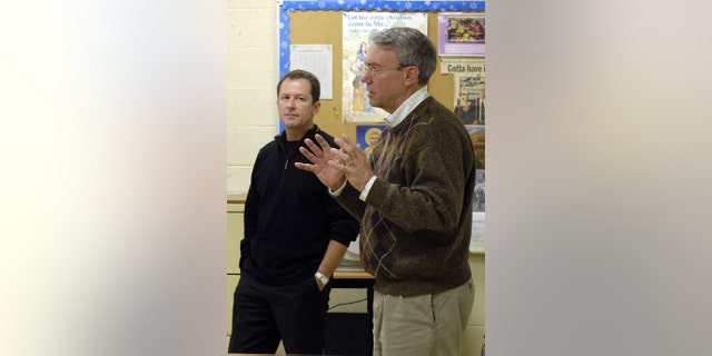 David Kaczynski, right, brother of the Unabomber, Ted Kaczynski, and Gary Wright, a Unabomber victim, speak to students in a classroom in Troy, New York, April 17, 2007.