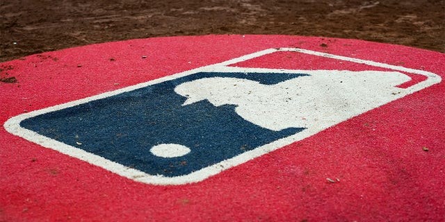 A general view of the MLB logo on the on-deck circle during the game between the New York Mets and the Cincinnati Reds at Great American Ball Park on July 05, 2022 in Cincinnati, Ohio.