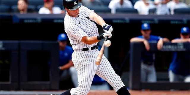 New York Yankees' DJ LeMahieu hits a home run against the Kansas City Royals during the fifth inning of a baseball game Sunday, July 31, 2022, in New York. 