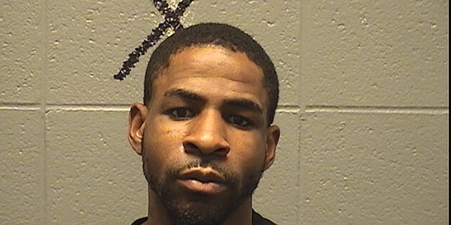 Dontrell Hollie, 29, is accused of robbing a man a a Red Line train in Chicago (Cook County Sheriff's Office)