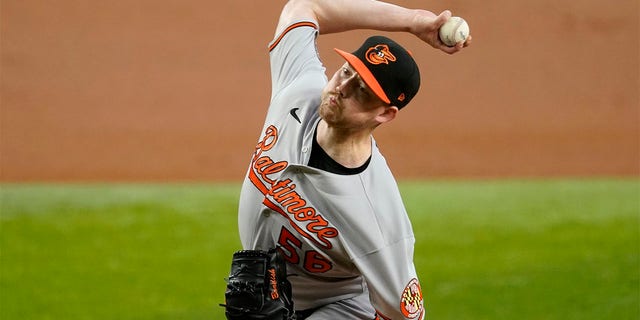 Baltimore Orioles starting pitcher Kyle Bradish throws to the Texas Rangers in the first inning of a baseball game, Wednesday, Aug. 3, 2022, in Arlington, Texas. 