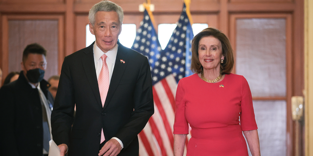 Speaker of the House Nancy Pelosi (R) (D-CA) accompanies Singapore Prime Minister Lee Hsien Loong (L) at the U.S. Capitol March 30, 2022 in Washington, DC. 