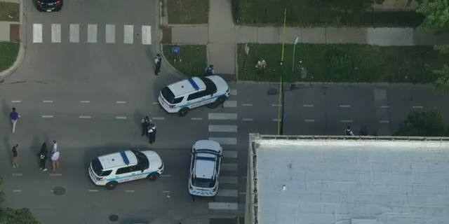 Chicago police say that three people are injured after a shooting near a high school on the city's West Side.