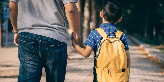 Health experts said parents and guardians should be looking for warning signs that their child’s backpack is too heavy.