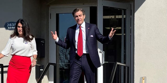 Republican Senate candidate Mehmet Oz greets the media after voting in Pennsylvania's primary, on May 17, 2022 in Bryn Athyn, Pennsylvania