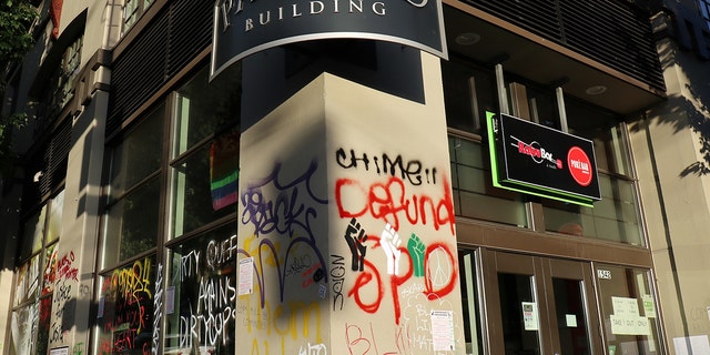 The Packard Building, an apartment building inside Seattle's so-called Capitol Hill Autonomous Zone, is seen damaged and vandalized in June 2020. Residents of the building appealed to city officials for assistance in the absence of a functioning law enforcement presence.