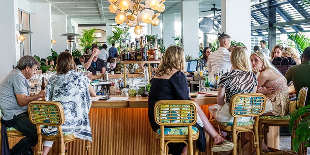 A busy dining scene in Bal Harbour, Florida, in summer 2022. 
