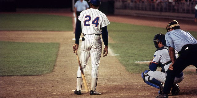 American baseball player Willie Mays (#24), of the New York Mets, steps up to home plate during a game (against the Chicago Cubs) at Shea Stadium, in the Corona neighborhood of Queens, New York, New York, August 5, 1972.