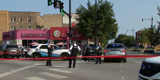 Four people in Chicago were injured on Aug. 24 during a drive-by shooting outside a high school on the city's Northwest side.