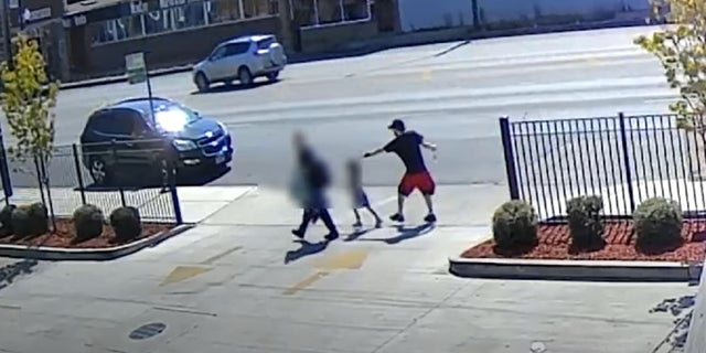 Screengrab shows portion of surveillance footage released by police showing attempted kidnapping of 5-year-old girl