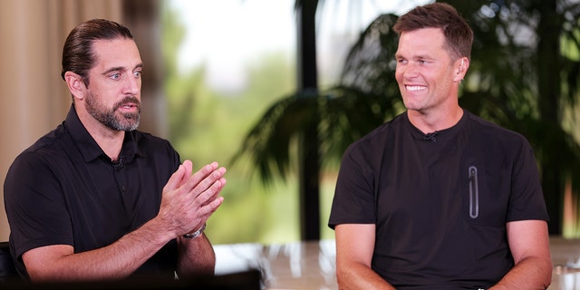Aaron Rodgers and Tom Brady take part in the quarterback roundtable at Wynn Golf Club on June 1, 2022, in Las Vegas.