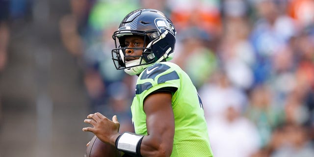 Geno Smith #7 of the Seattle Seahawks drops back during the first quarter against the Denver Broncos at Lumen Field on September 12, 2022, in Seattle, Washington.