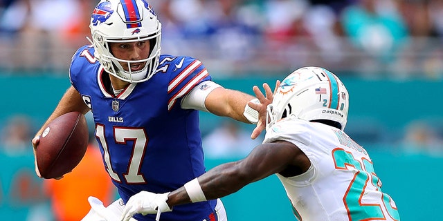 Josh Allen, #17 of the Buffalo Bills, carries the ball during the second half of the game against the Miami Dolphins at Hard Rock Stadium on Sept. 25, 2022 in Miami Gardens, Florida.