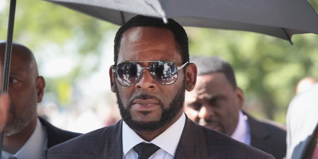 R. Kelly was convicted of racketeering and sex trafficking. He was sentenced to 30 years in prison earlier this year, and was then also convicted of child pornography and obstruction-of-justice charges.