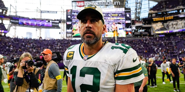 Aaron Rodgers of the Green Bay Packers walks off the field after a loss to the Minnesota Vikings at U.S. Bank Stadium Sept. 11, 2022, in Minneapolis. The Vikings defeated the Packers 23-7.