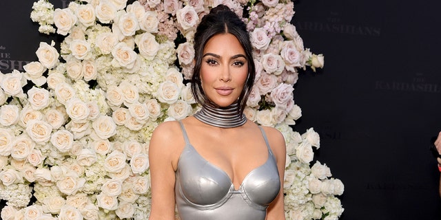 Kim Kardashian got candid about her four kids, as the reality television star opened up about multitasking as a mom. 