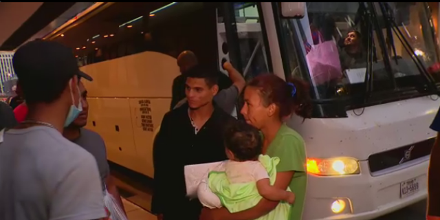 A migrant family in Chicago arriving on a bus from Texas.