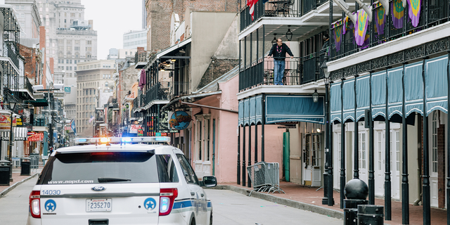 A police vehicle blocks access to Bourbon Street in New Orleans, Louisiana, U.S., on Tuesday, Feb. 16, 2021. Since 1857, Mardi Gras celebrations in New Orleans have been called off only 14 times, because of war, mob violence, or labor disputes. Not even the last great pandemic could quell the street parades. Mark the history books: This year will be the 15th. Photographer: Bryan Tarnowski/Bloomberg via Getty Images