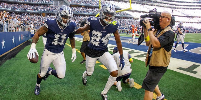 Dallas Cowboys' Micah Parsons (11) celebrates his fumble recovery and touchdown against the Chicago Bears, Oct. 30, 2022, in Arlington, Texas.