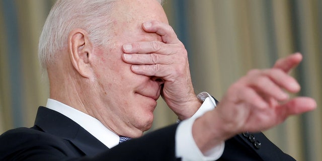 FILE – President Joe Biden gestures as he delivers remarks after late-night passage of a $1 trillion infrastructure bill to repair the nation's airports, roads and bridges, at the White House in Washington, D.C., on November 6, 2021. 