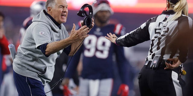 New England Patriots head coach Bill Belichick argues a call during the second half of an NFL football game against the Chicago Bears, Monday, Oct. 24, 2022, in Foxborough, Mass. 
