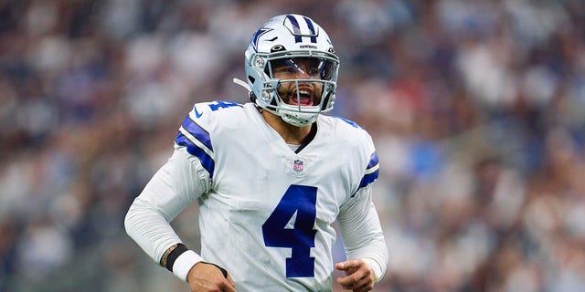 Dak Prescott #4 of the Dallas Cowboys reacts after a play against the Detroit Lions during the second half at AT&amp;amp;T Stadium on October 23, 2022, in Arlington, Texas.