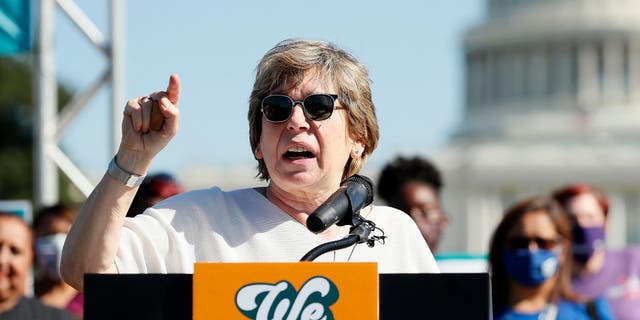 FILE – Randi Weingarten, president of the American Federation of Teachers, along with members of Congress, parents and caregiving advocates hold a press conference supporting Build Back Better investments in home care, child care, paid leave and expanded CTC payments in front of the U.S. Capitol Building on October 21, 2021 in Washington, D.C. 