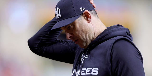 Manager Aaron Boone of the New York Yankees reacts against the Houston Astros during the eighth inning in Game 2 of the American League Championship Series at Minute Maid Park Oct. 20, 2022, in Houston. 