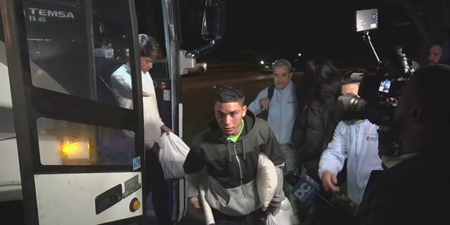 A bus carrying migrants arrived in Washington, D.C., near Vice President Kamala Harris' residence, Thursday, Oct. 6, 2022.