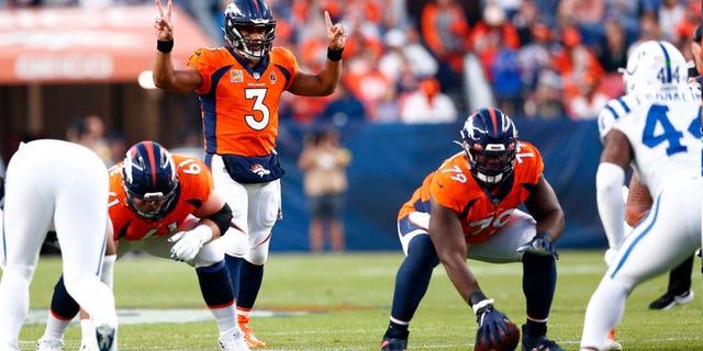 Denver Broncos quarterback Russell Wilson (3) signals to his team during a game against the Indianapolis Colts Oct. 6, 2022, at Empower Field at Mile High in Denver, Colo.