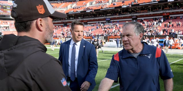 Head coach Bill Belichick of the New England Patriots shakes hands with head coach Kevin Stefanski of the Cleveland Browns after the game at FirstEnergy Stadium on Oct. 16, 2022, in Cleveland.