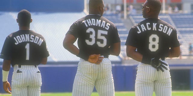 Lance Johnson #1, Frank Thomas #35 and Bo Jackson #8 of the Chicago White Sox stands for the National Anthem prior to the start of an Major League Baseball game circa 1991 at Comiskey Park in Chicago, Illinois. Thomas played for the White Sox from 1990 - 05. 